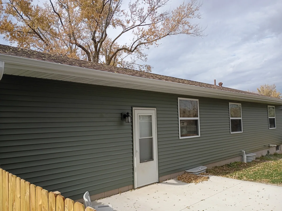 Seamless gutter installation on a home in Colfax, Iowa