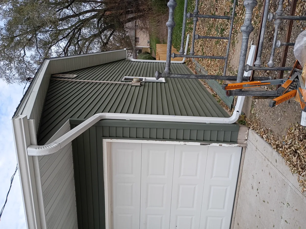 Seamless gutter installation on a home in Colfax, Iowa