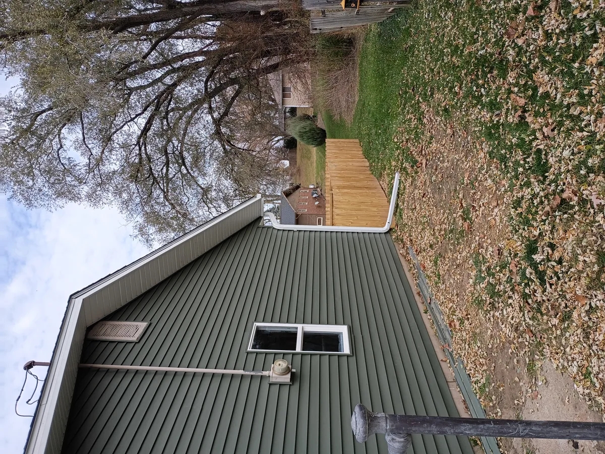 Seamless gutter installation on a home in Colfax, Iowa