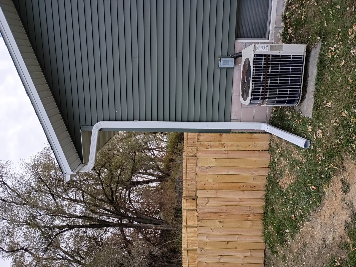 Seamless gutter installation on a home in Colfax, Iowa