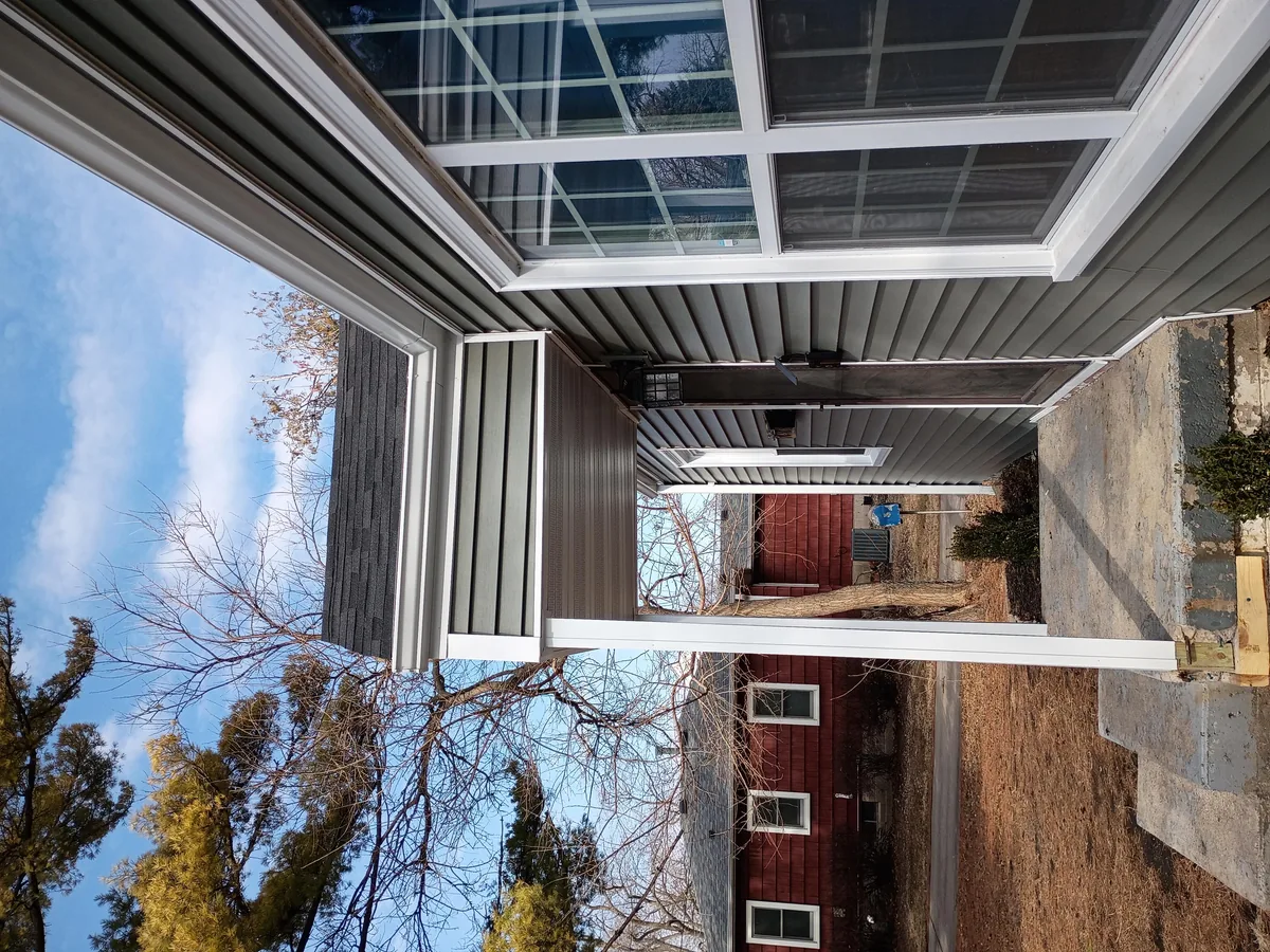 Seamless gutter installation on a home in Des Moines, Iowa