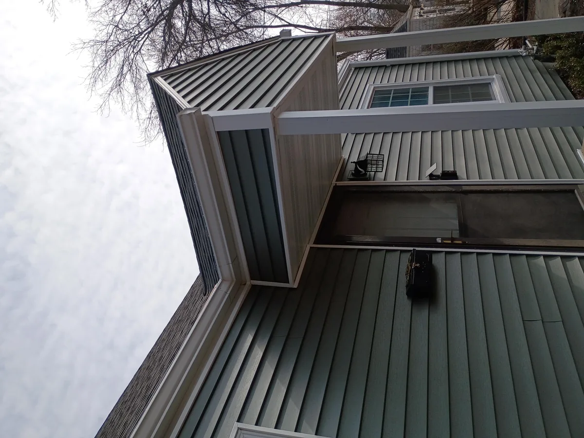 Seamless gutter installation on a home in Des Moines, Iowa